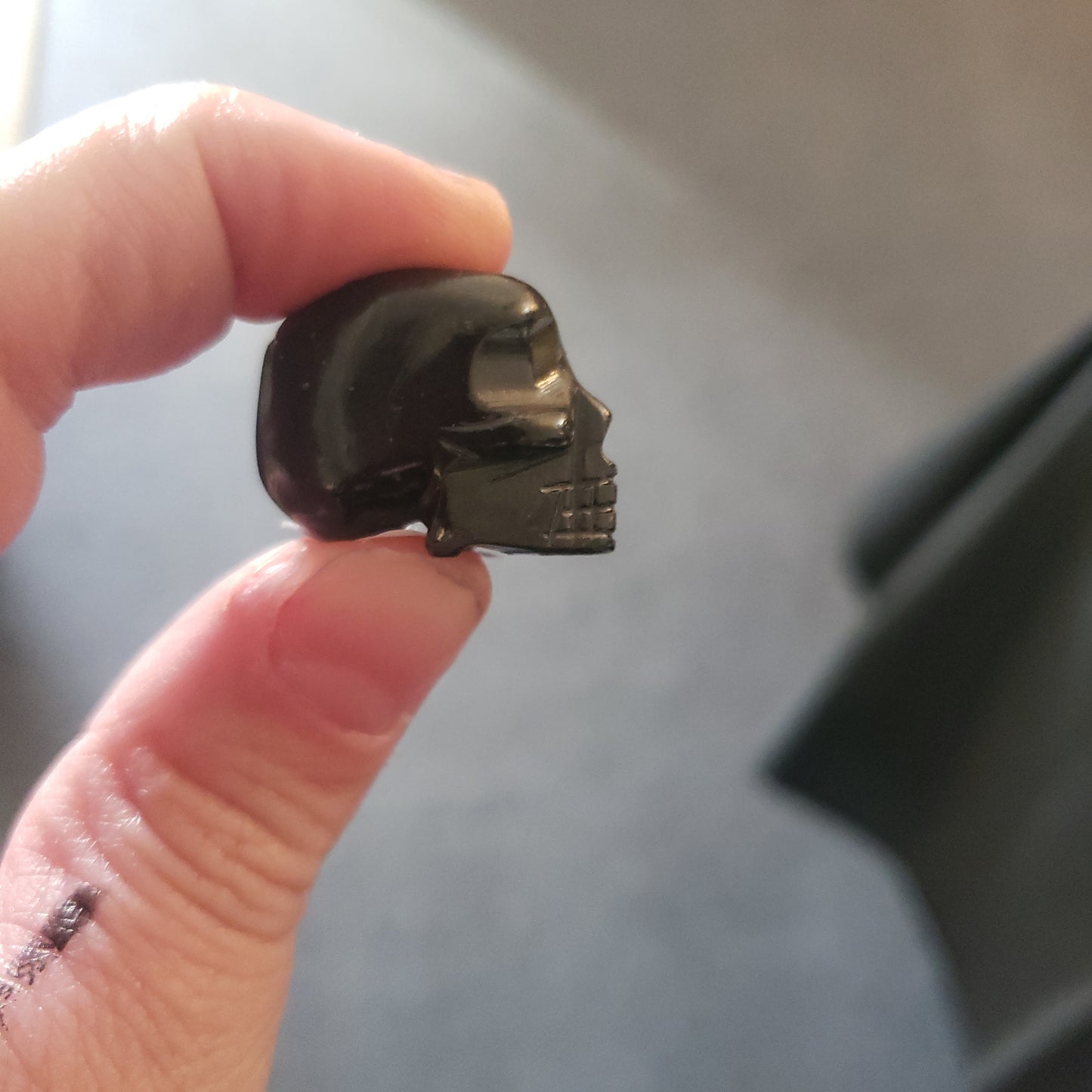 small obsidian skulls hand carved